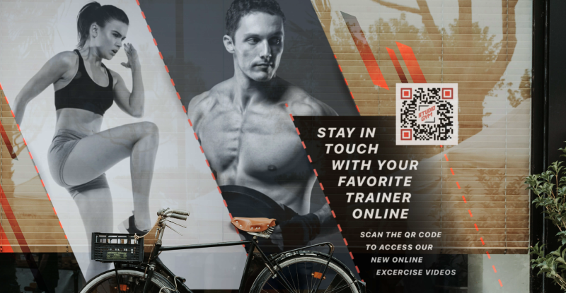 A gym uses a QR Code on their window so customers can access online exercise videos