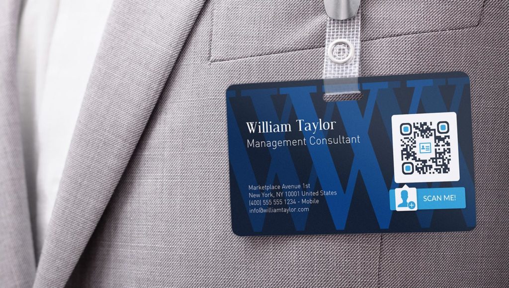Business card name tag with a VCard QR Code sharing contact details.