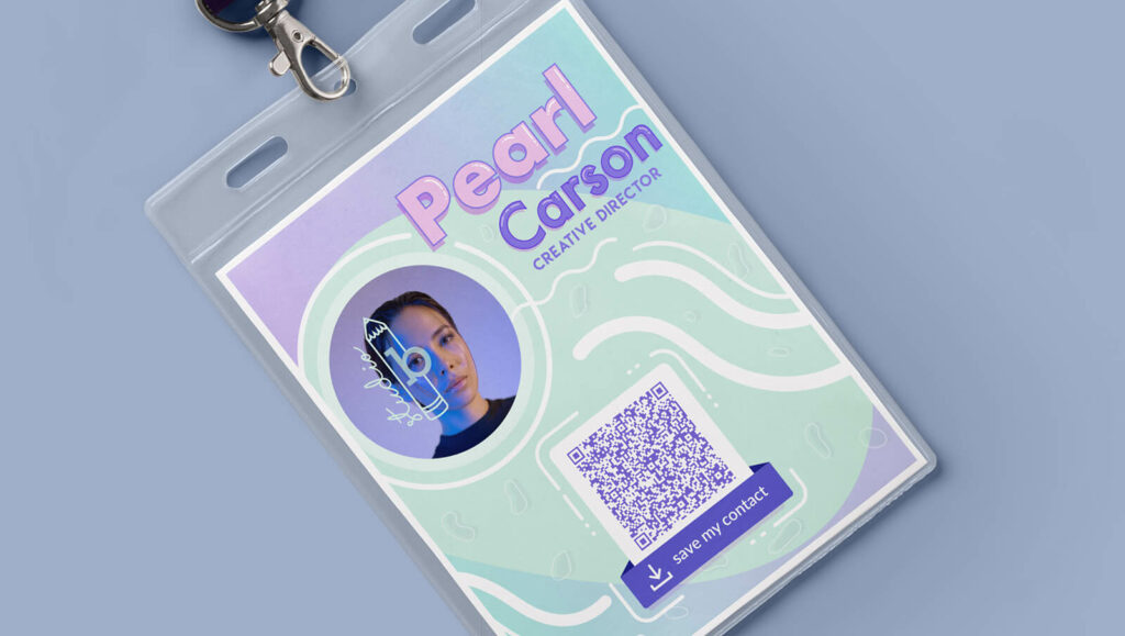 A vCard QR Code on a Creative Director's ID badge prompting people to scan and save their contact info