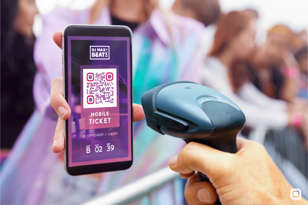 A QR Code mobile ticket displayed on the phone screen scanned before an event entry.